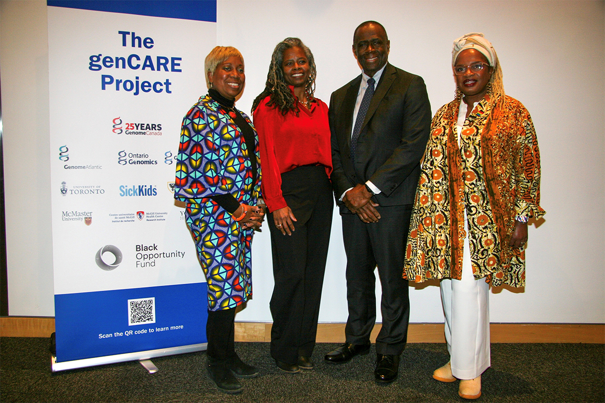 Four people stand to the right of a banner reading "The genCARE project"
