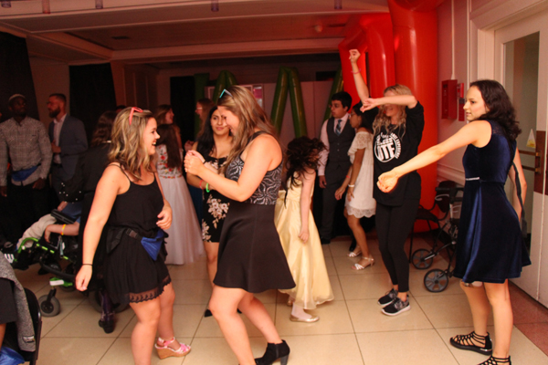 Group of teens dancing.