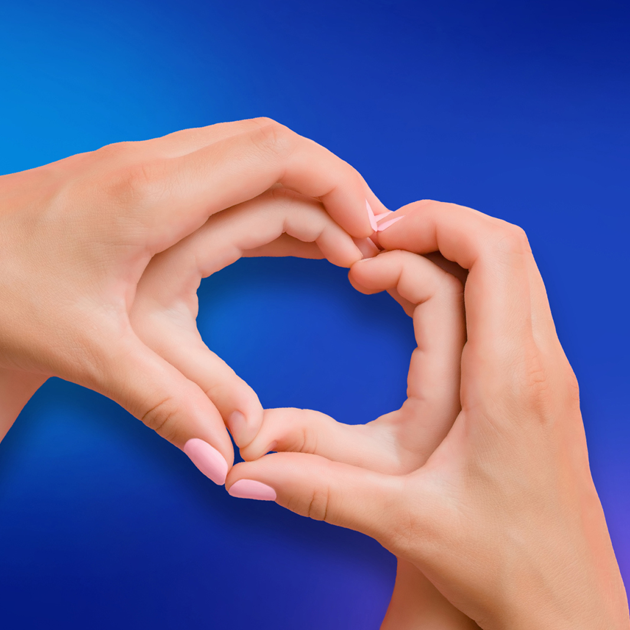 two hands in the shape of a heart on a blue background