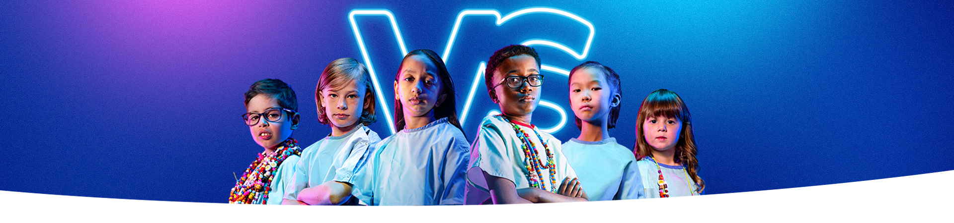 Six children standing together, crossing their arms. They are wearing hospital gowns, some are wearing colourful Bravery Beads around their neck.