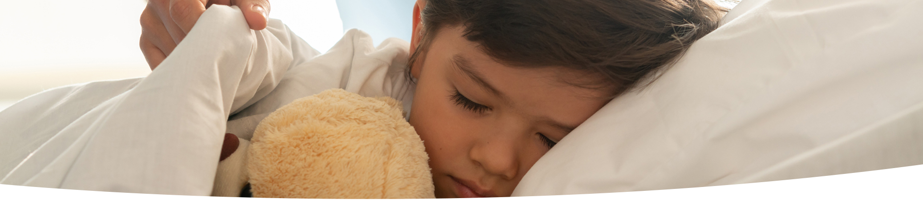 Child sleeping on a pillow