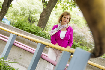 Shelly Weiss leans against a railing outside SickKids hospital