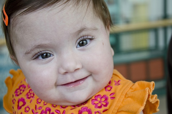 11 month old girl smiling