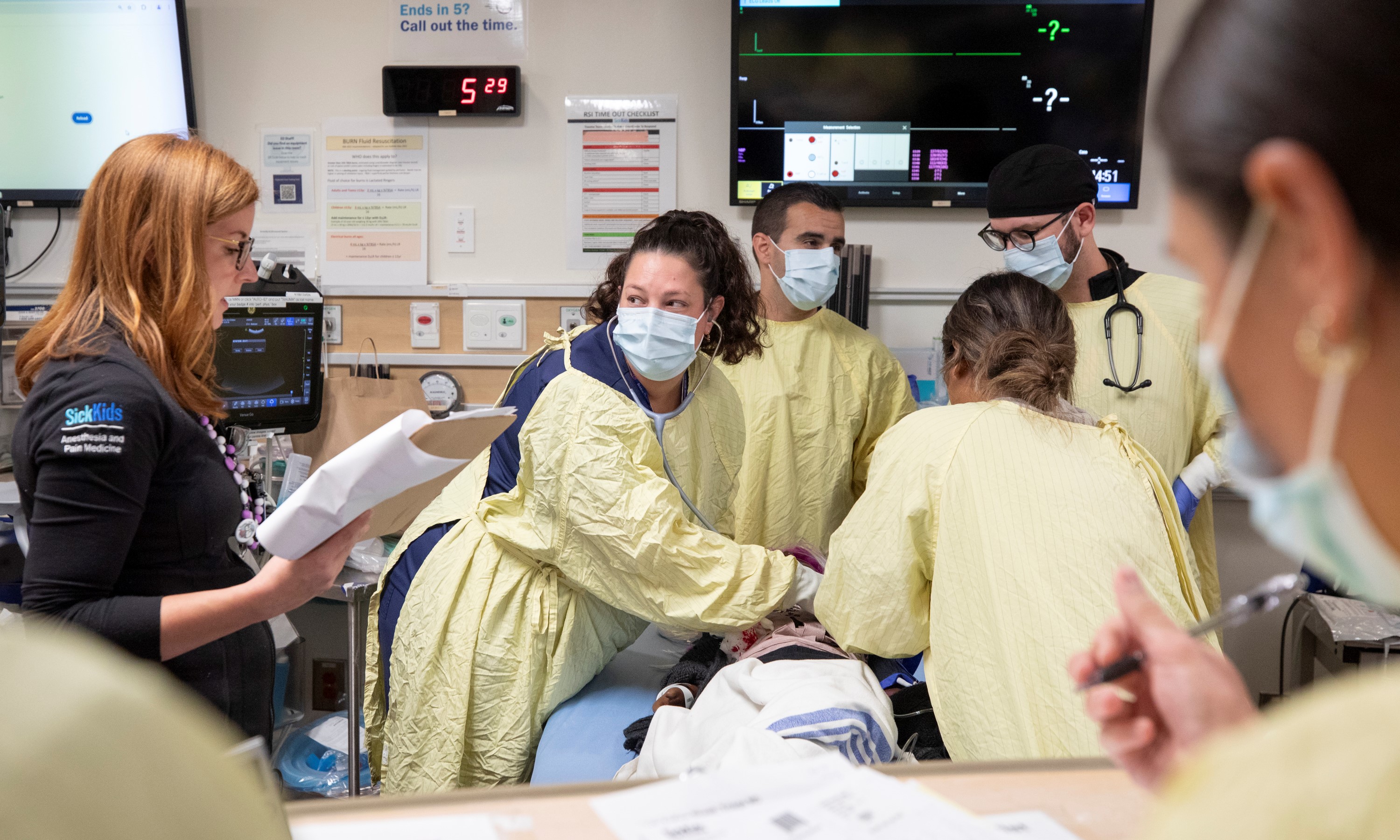 A care team treating a simulated patient in a Code Orange simulation