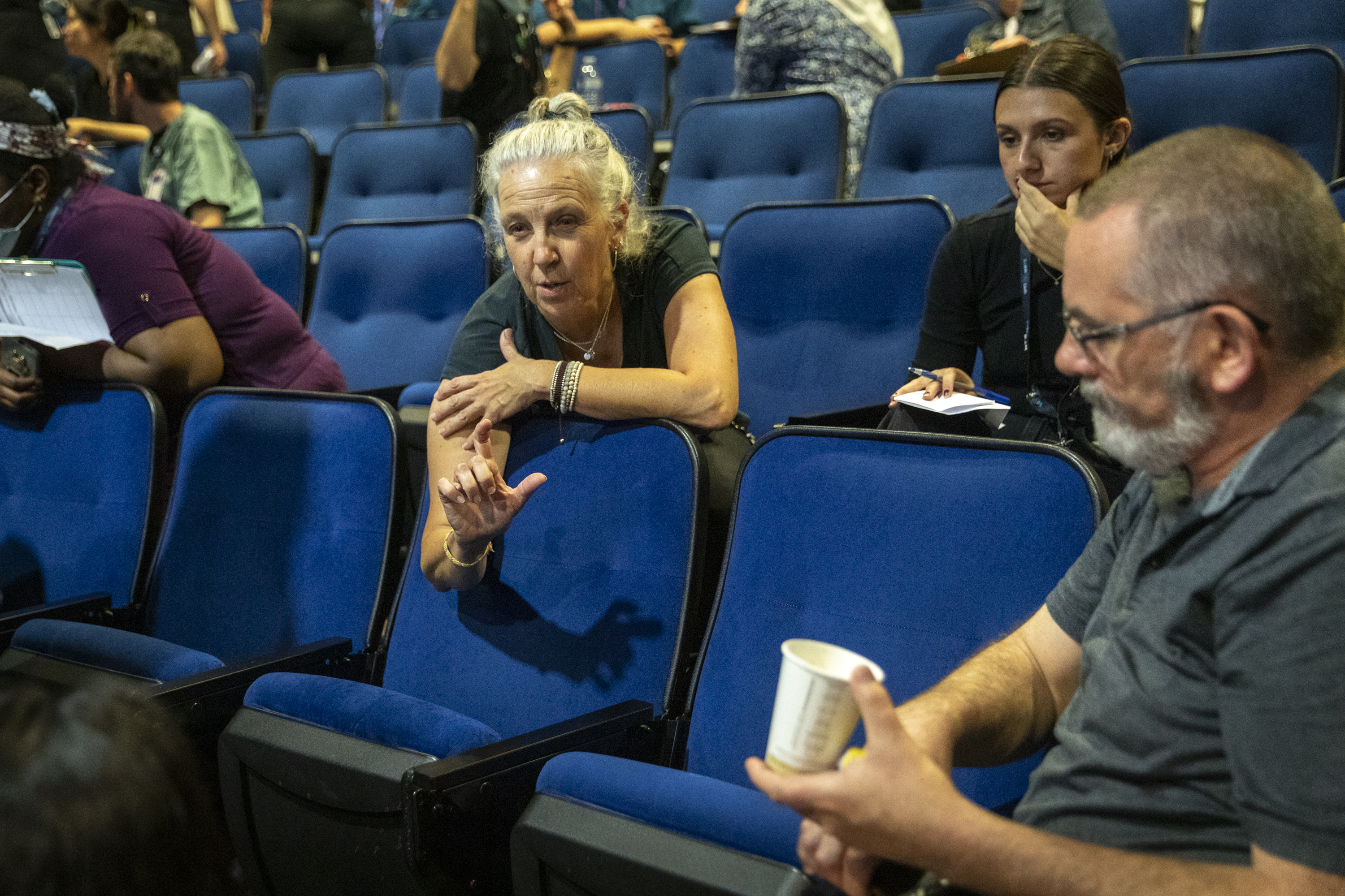 Andrea Boysen speaks to other SickKids staff at the Code Orange debrief