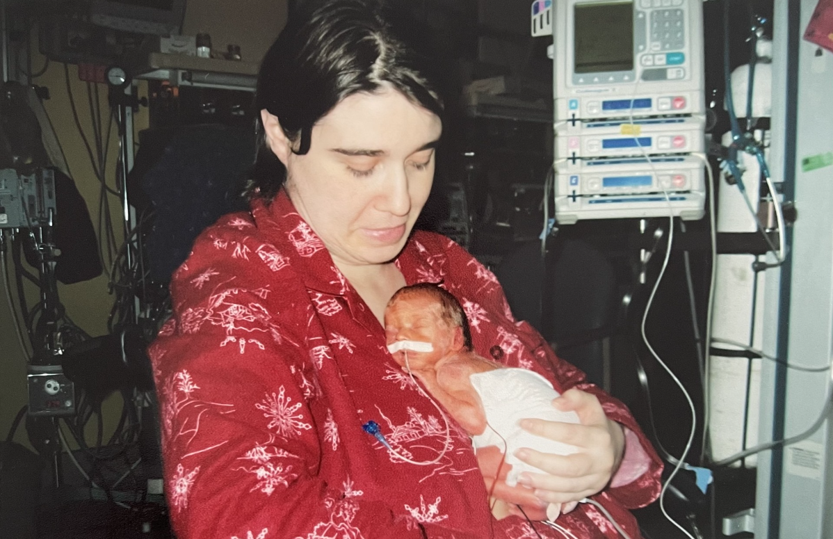 Rita doing skin-to-skin with her son Mark in the NICU. 