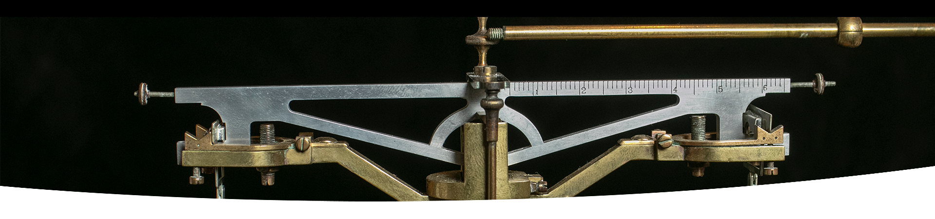 A close-up of an apothecary scale.